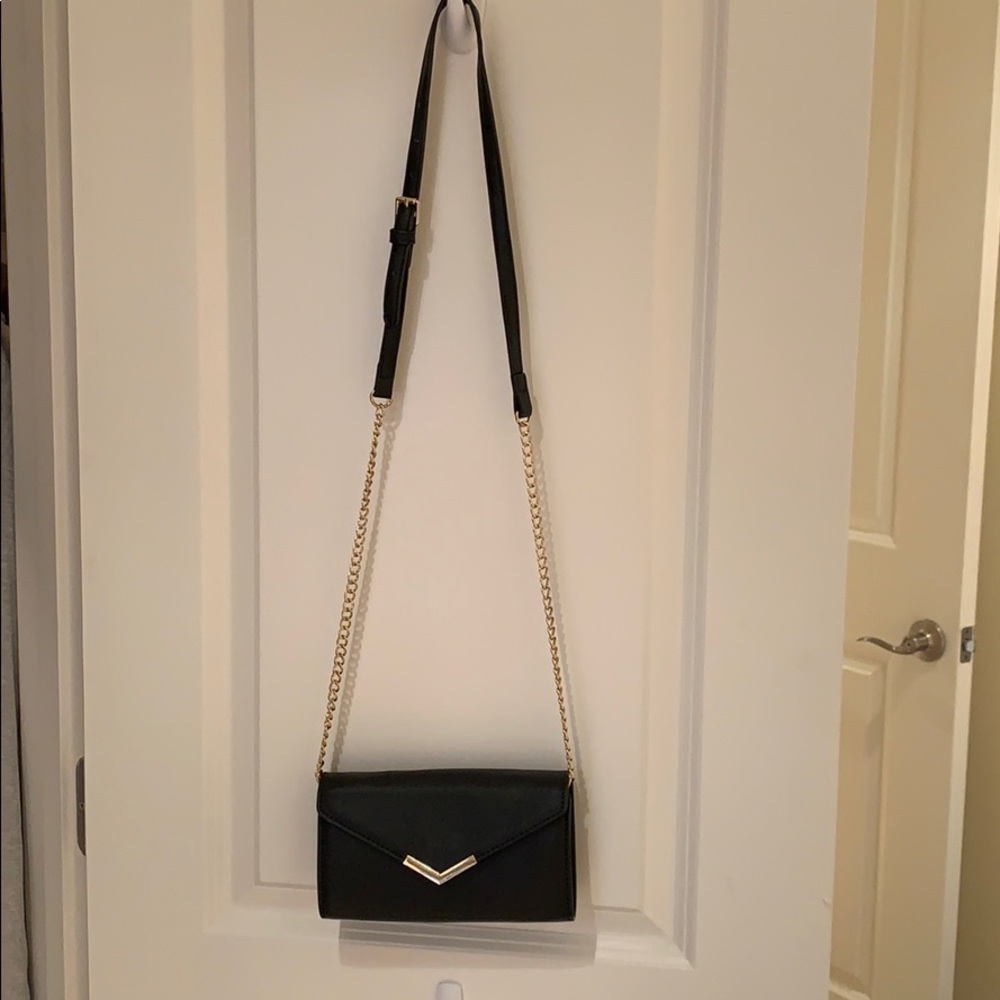 Black crossbody wallet purse with gold chain strap